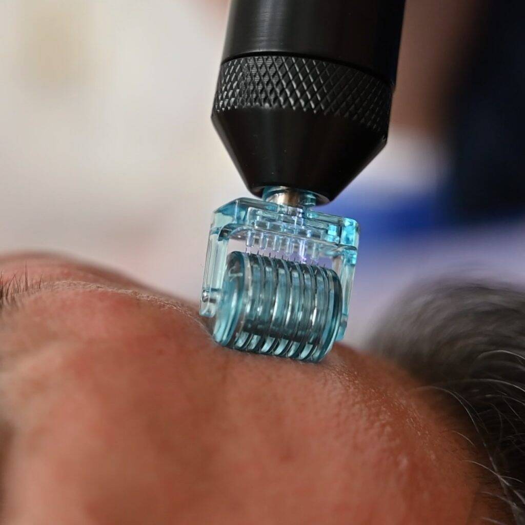 a person getting a facial treatment